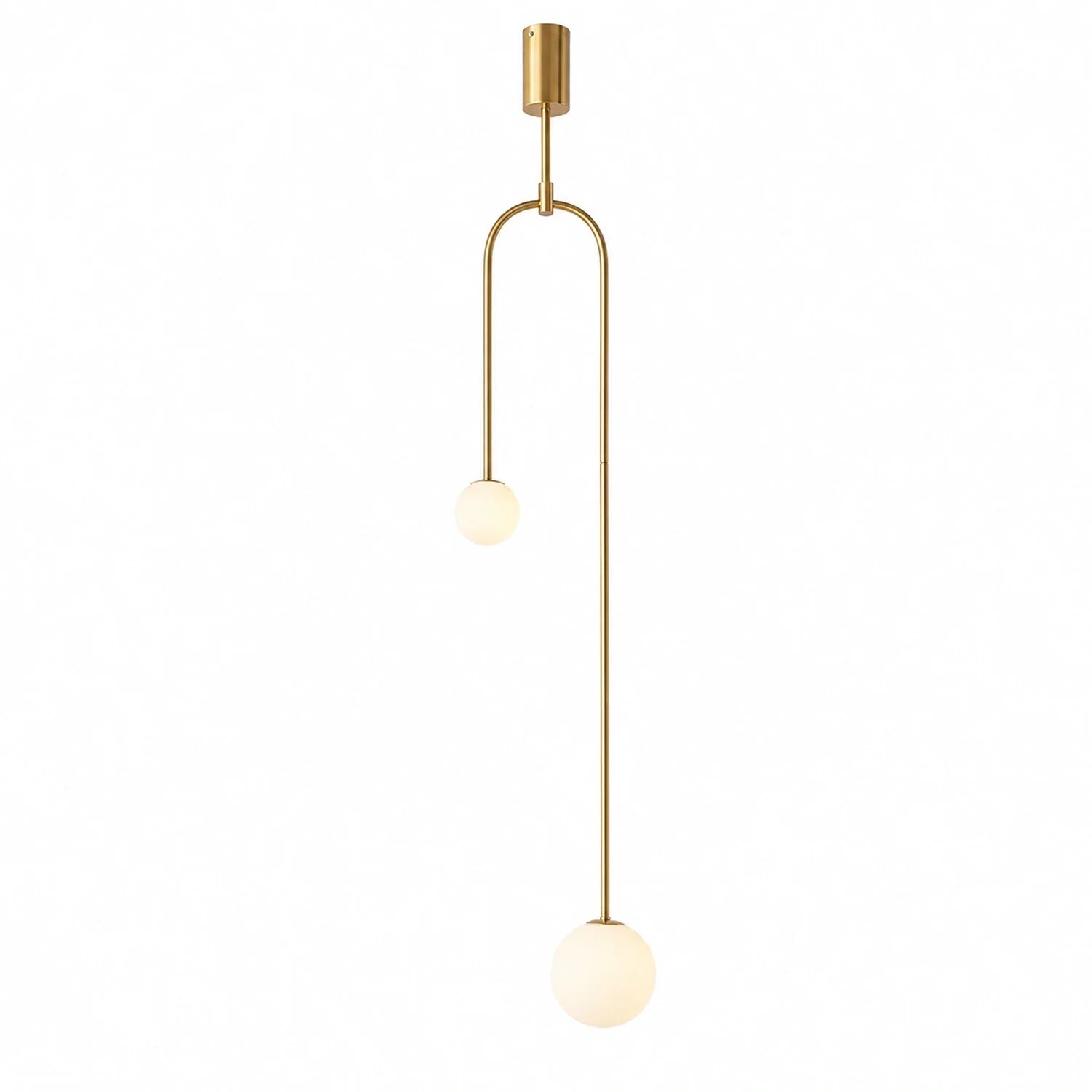 Modern double globe pendant light featuring a sleek gold-tone frame with two offset white glass spheres suspended at different heights for minimalist decor