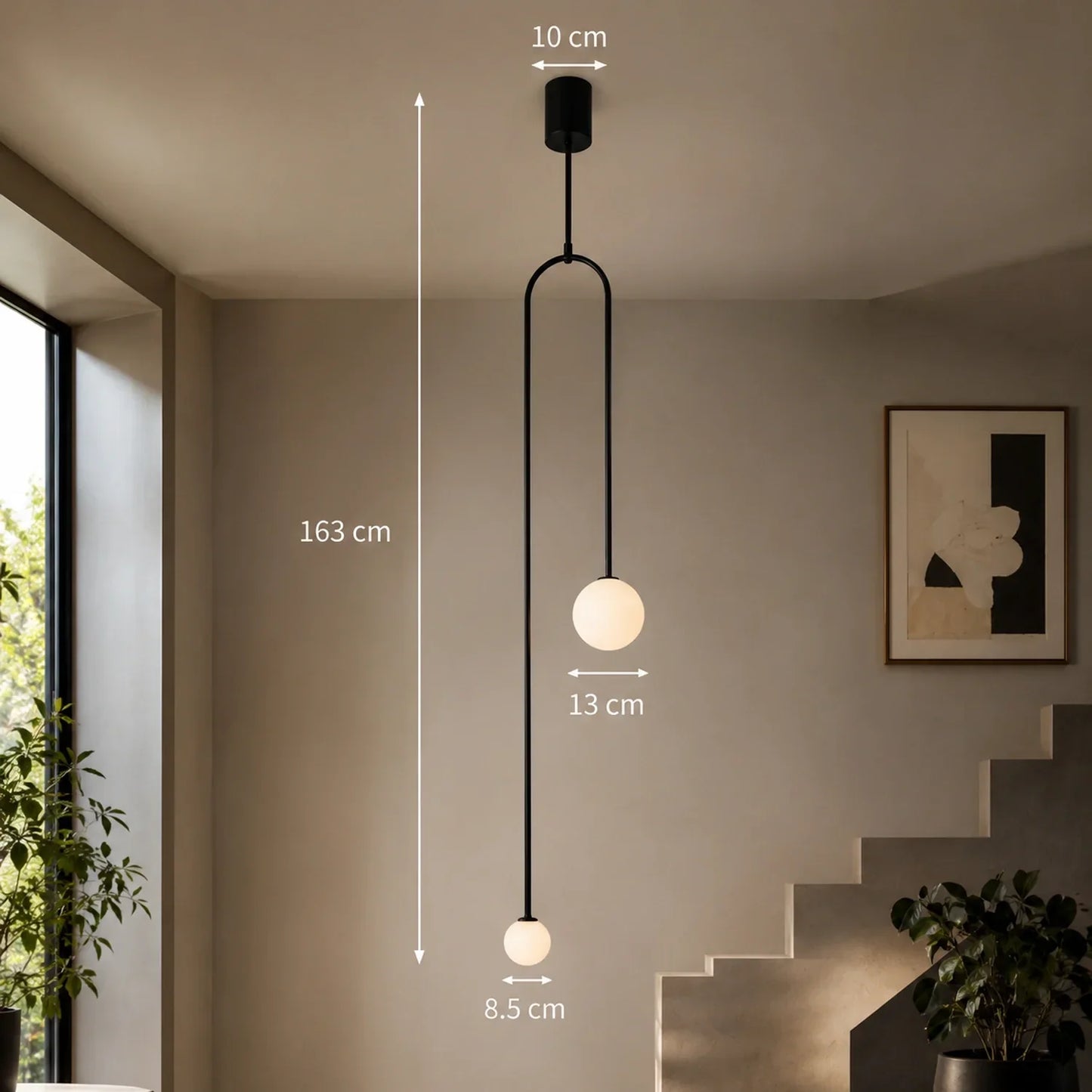Modern black double globe pendant light with two illuminated glass spheres, showing dimensions of 163 cm height, 13 cm and 8.5 cm globe widths.
