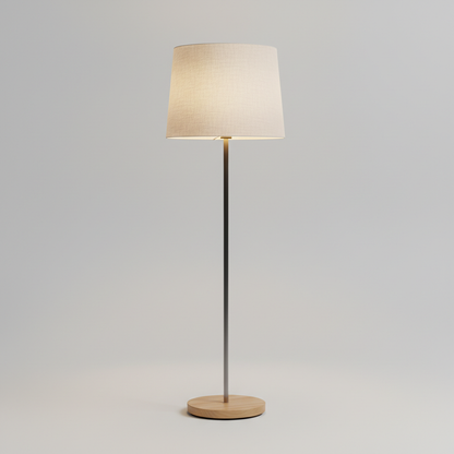 Modern floor lamp with cream shade and slim stem on a round base
