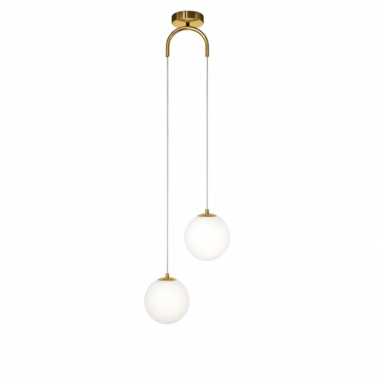 Modern pendant light featuring two white glass globes suspended from a gold arched ceiling mount, creating an elegant interior lighting feature.