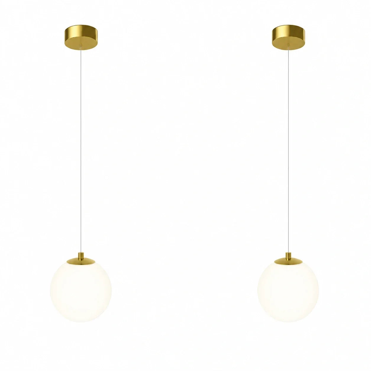 Two modern pendant lights featuring spherical white glass globes suspended from circular brass ceiling mounts against a plain white background.