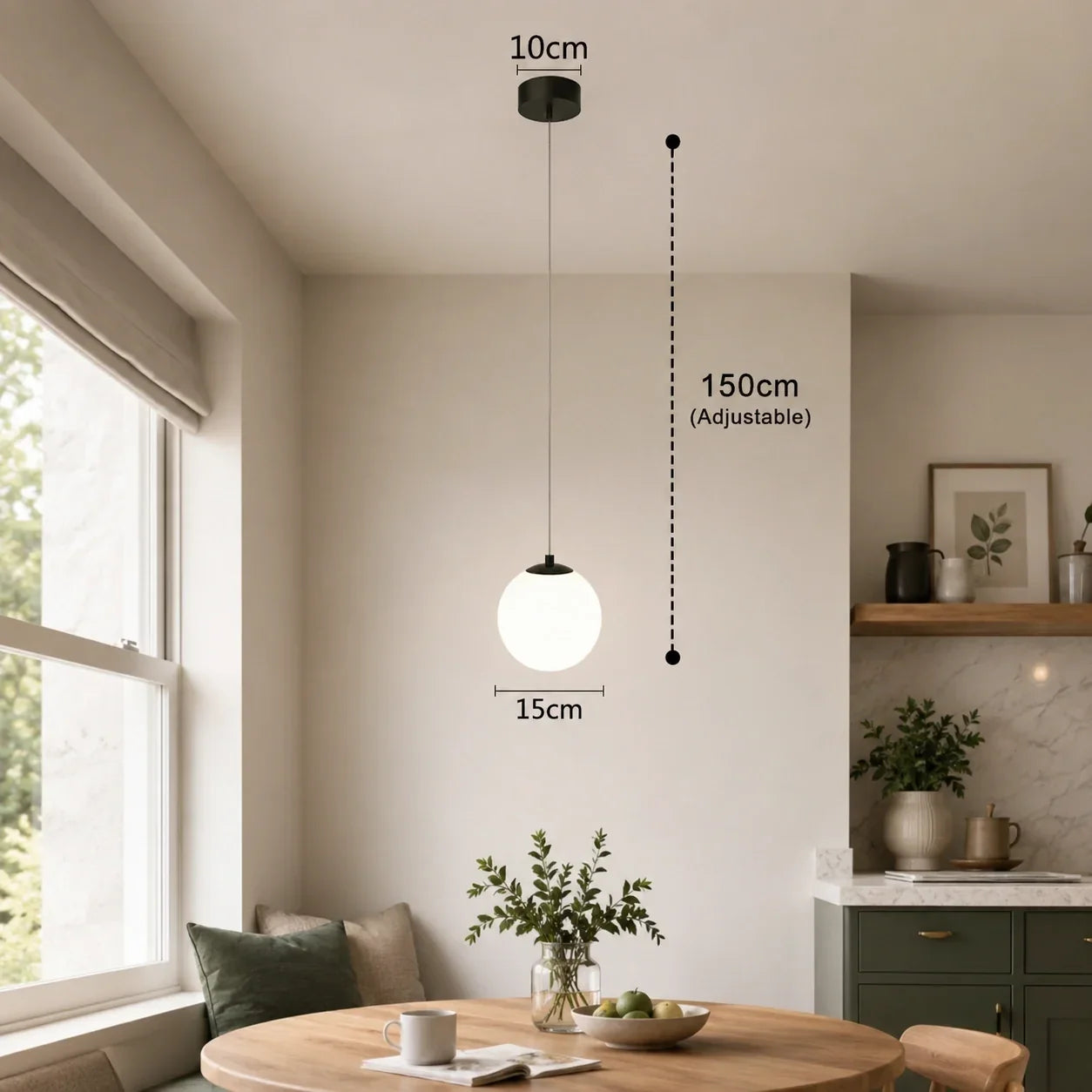 Modern black single-head glass globe pendant light hanging above a dining table, showing 15cm globe diameter and 150cm adjustable cable length.