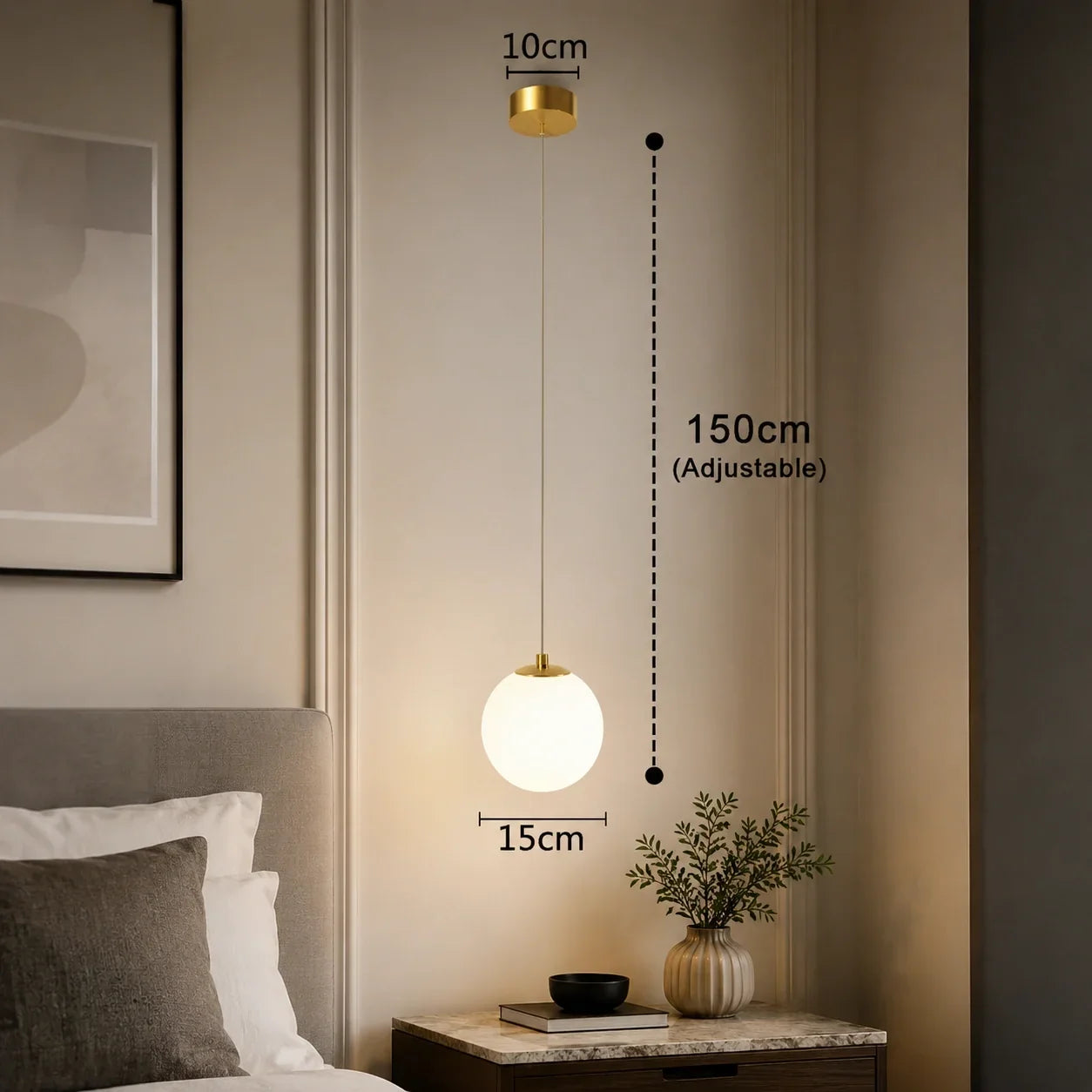 Modern single gold pendant light with a white glass globe, featuring adjustable 150cm height and 15cm diameter, displayed in a stylish bedroom setting.