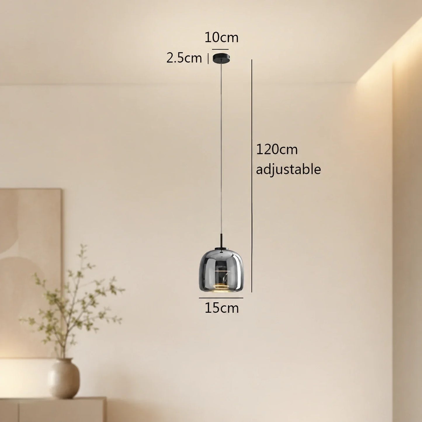Modern single-head pendant light with a 15 cm smoky grey glass shade and adjustable 120 cm cable, displayed with technical dimensions in a room.
