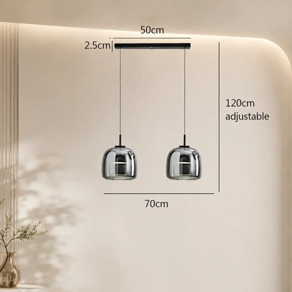 Modern double-head pendant light in smoky grey glass with adjustable 120cm cables, featuring a 50cm ceiling plate and 70cm total width dimensions.