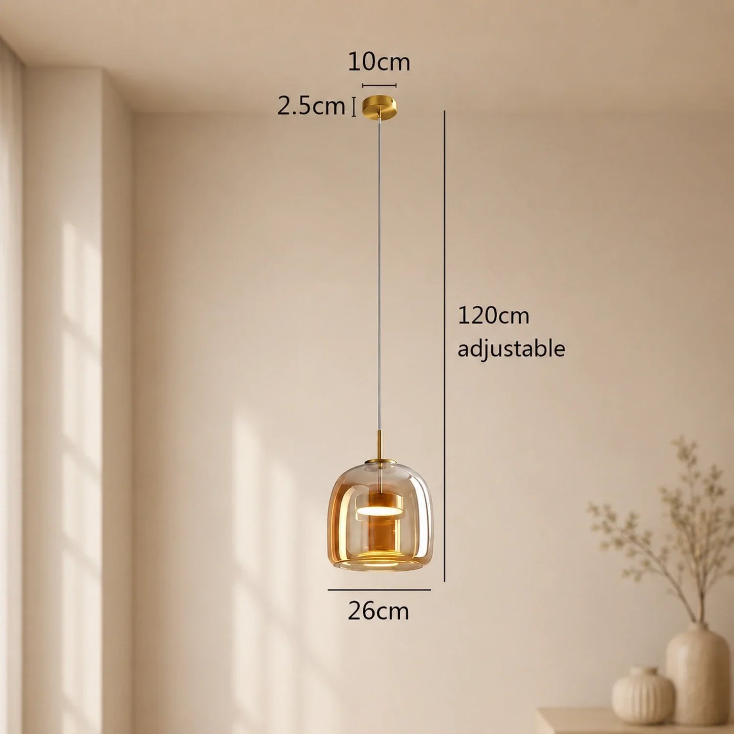 Modern amber glass pendant light with a 26 cm diameter and 120 cm adjustable cord, featuring a gold ceiling rose and minimalist Nordic design style.