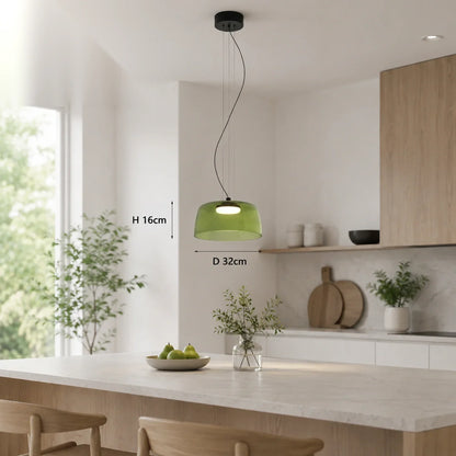 Modern green glass pendant light with integrated LED, 32cm diameter, suspended above a kitchen island in a contemporary dining space.
