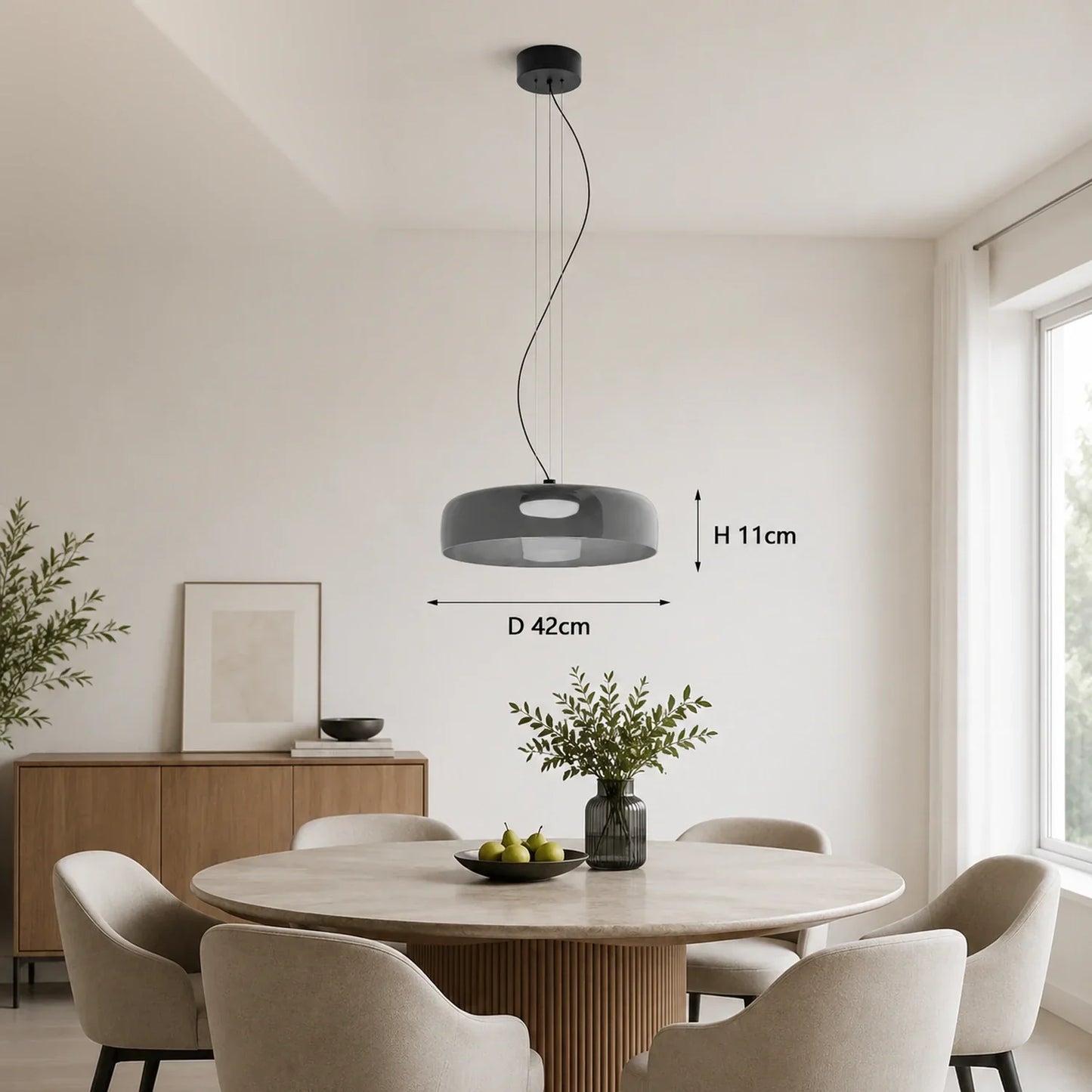 Modern gray glass pendant light with integrated LED, 42cm diameter, suspended above a round dining table in a contemporary interior setting.