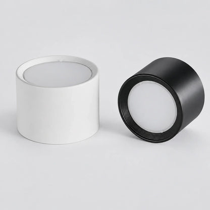 Modern LED ceiling lights in white and black. These minimalist, surface-mounted aluminium downlights are ideal for contemporary indoor lighting.