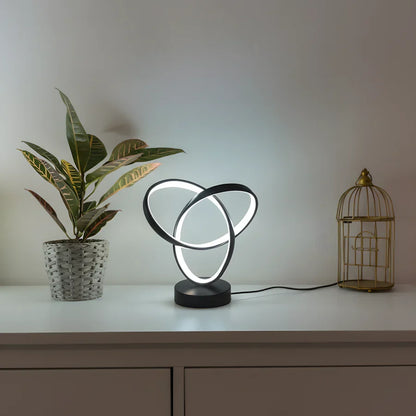 Black spiral LED lamp with cool illumination