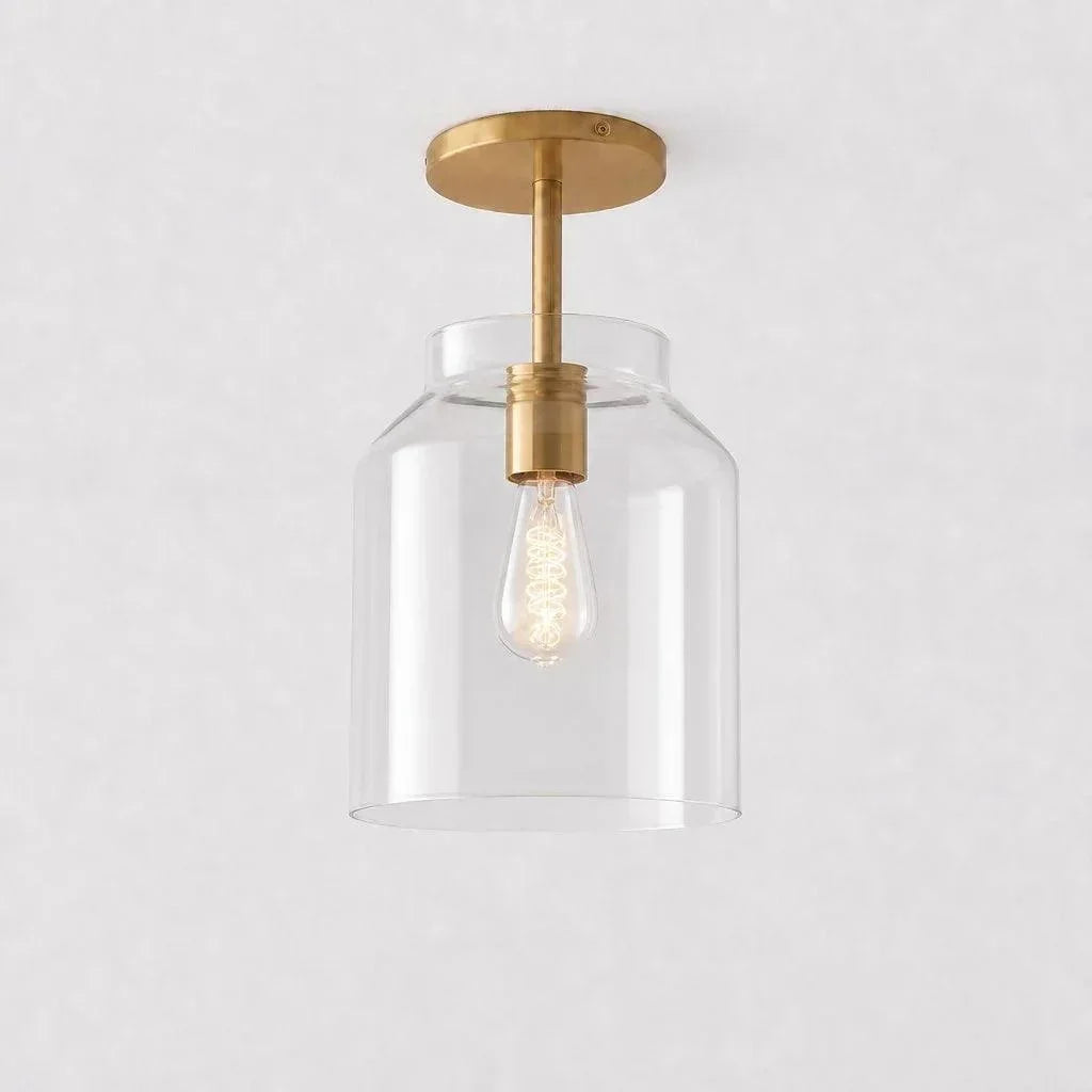Clear glass ceiling light with brass stem