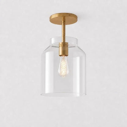 Clear glass ceiling light with brass stem