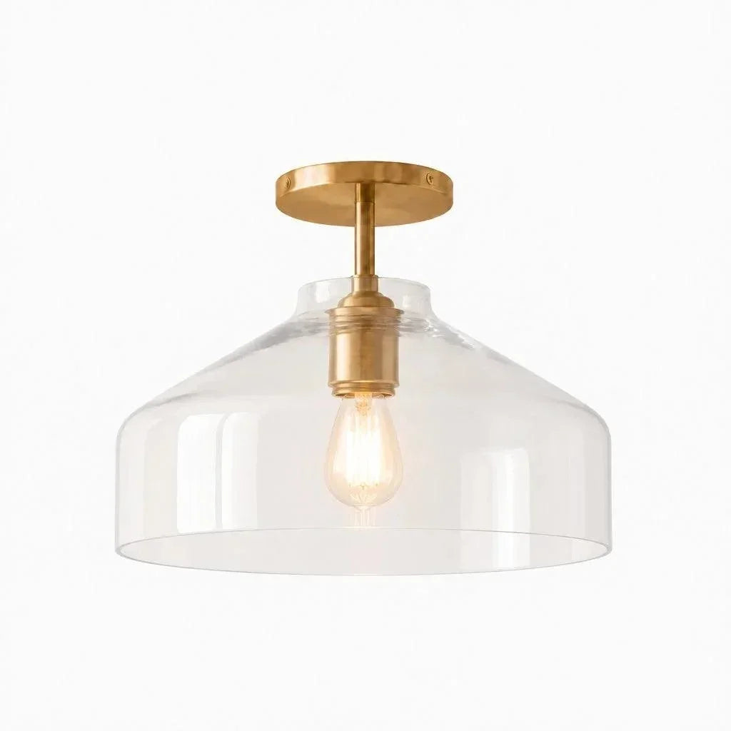 Wide clear glass ceiling light with brass hardware