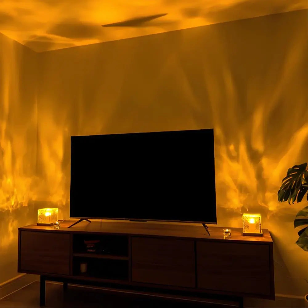 Cube lamps casting warm light beside a television