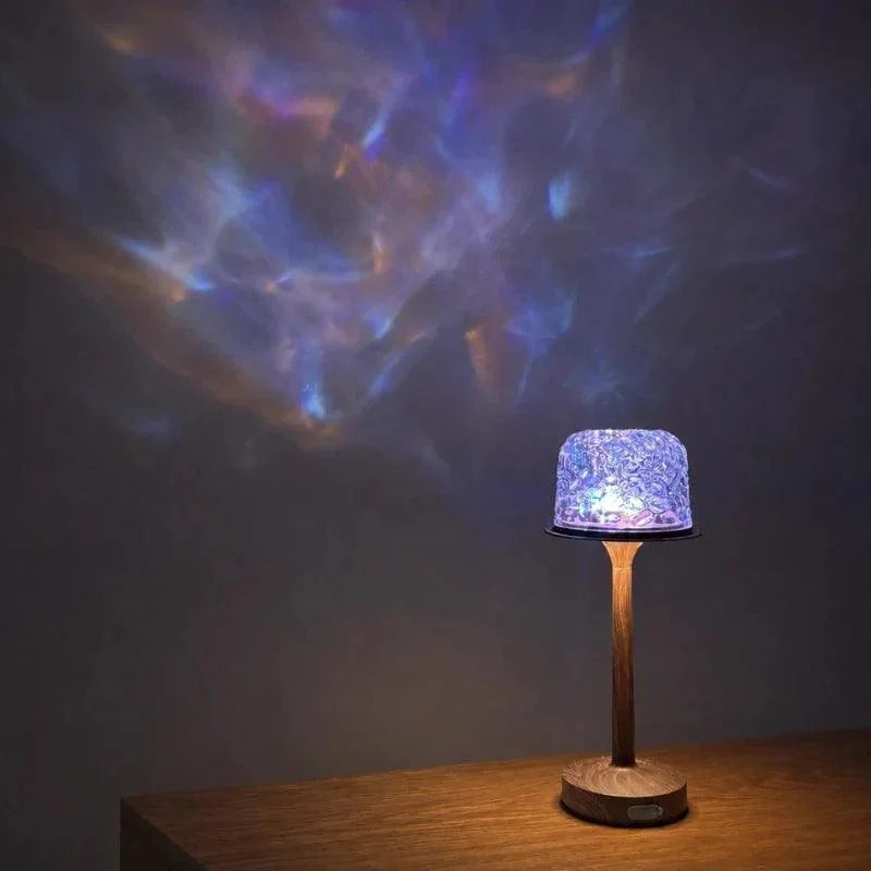 Blue aurora pattern from an oak-finish table lamp