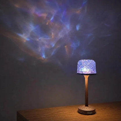 Blue aurora pattern from an oak-finish table lamp