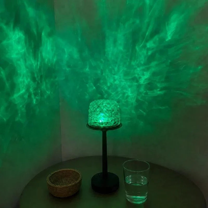 Green aurora projection above a walnut-finish lamp