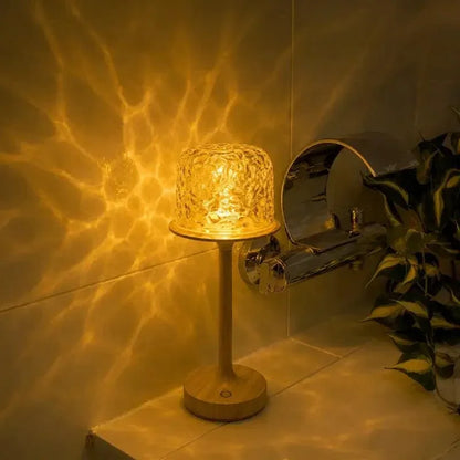 Golden aurora projector lamp beside a mirror