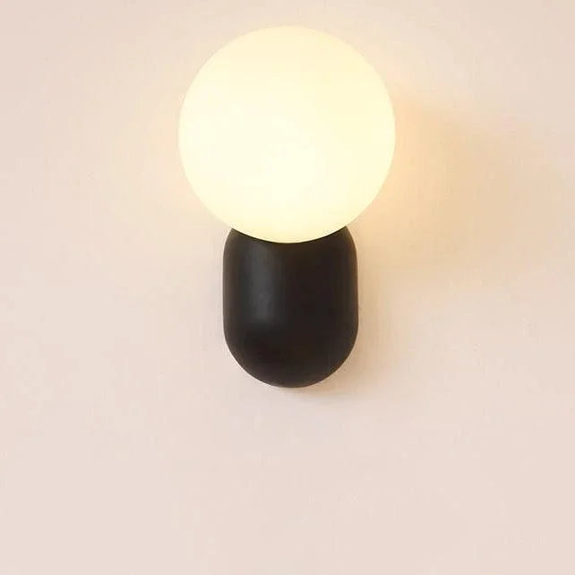 Black opal globe wall sconce close-up