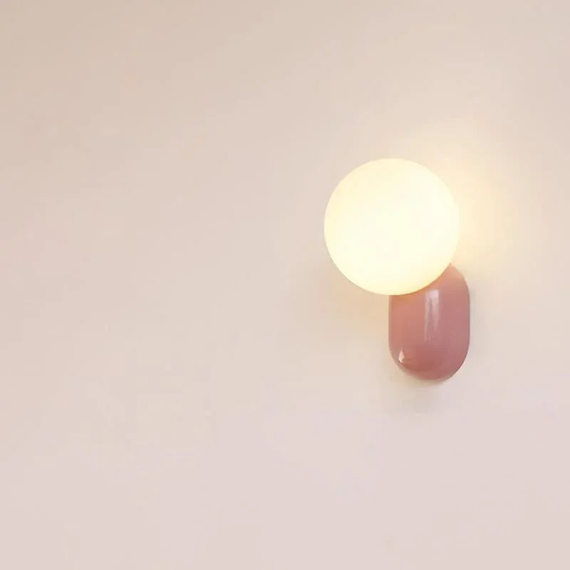 Pink resin base opal globe wall sconce