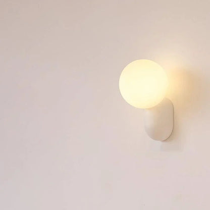 White resin base opal globe wall light