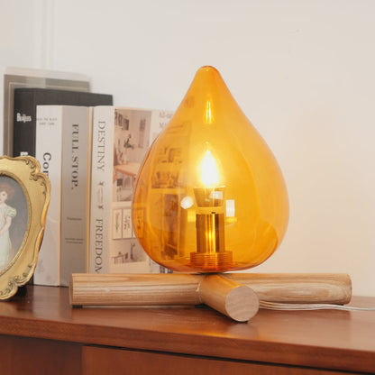 Orange flame-shaped glass table lamp with solid wood cross base 19