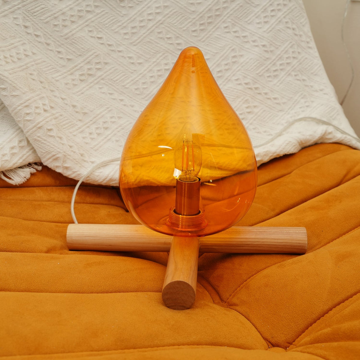 Orange flame-shaped glass table lamp with solid wood cross base 20