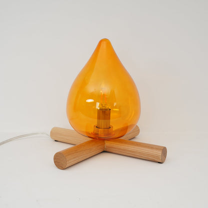 Orange flame-shaped glass table lamp with solid wood cross base 25
