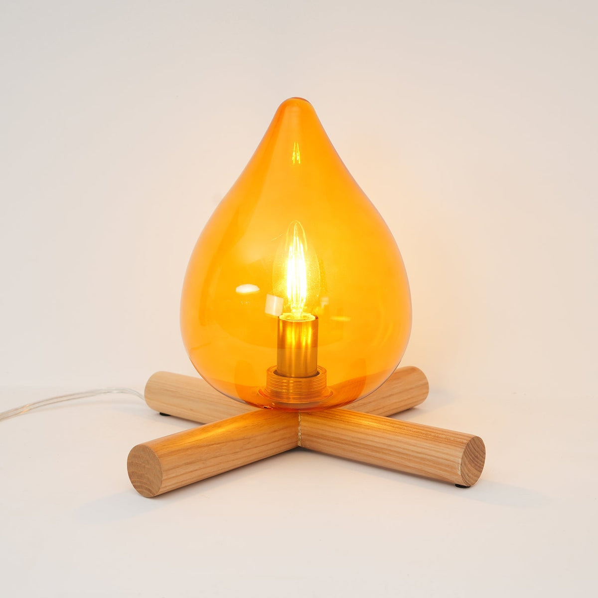 Orange flame-shaped glass table lamp with solid wood cross base 26
