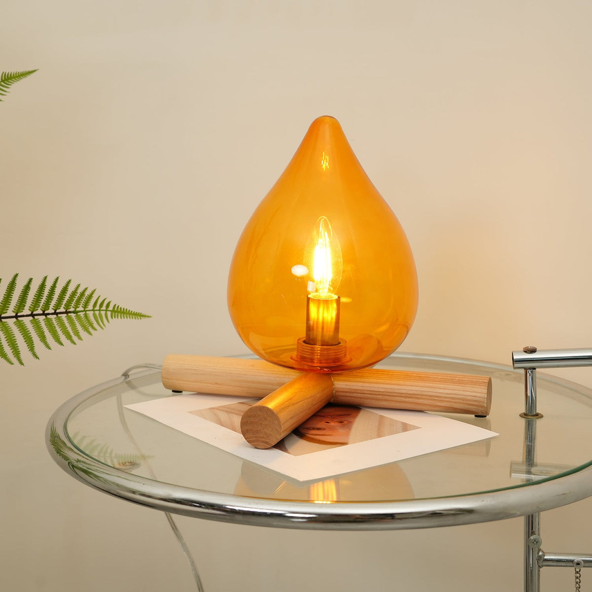 Orange flame-shaped glass table lamp with solid wood cross base 30