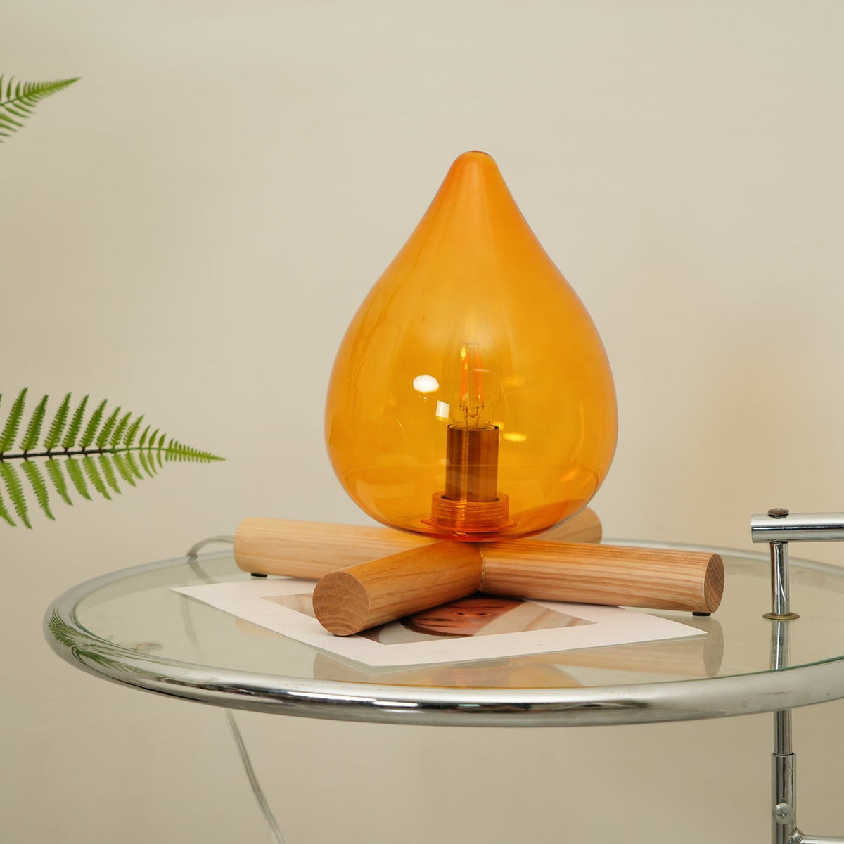Orange flame-shaped glass table lamp with solid wood cross base 31