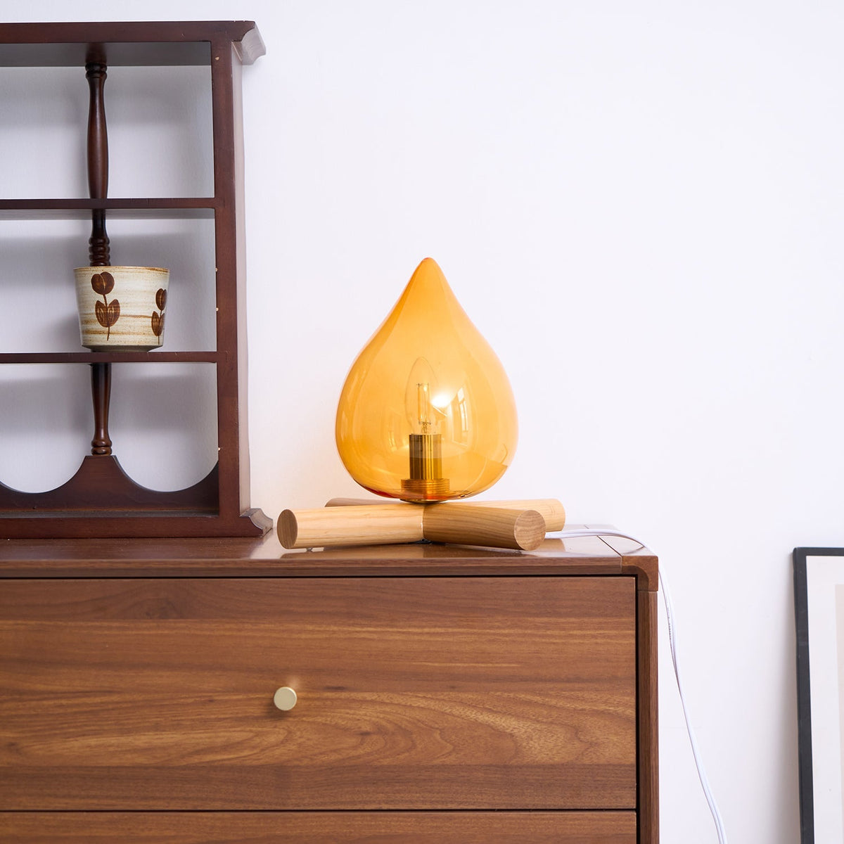 Orange flame-shaped glass table lamp with solid wood cross base 34