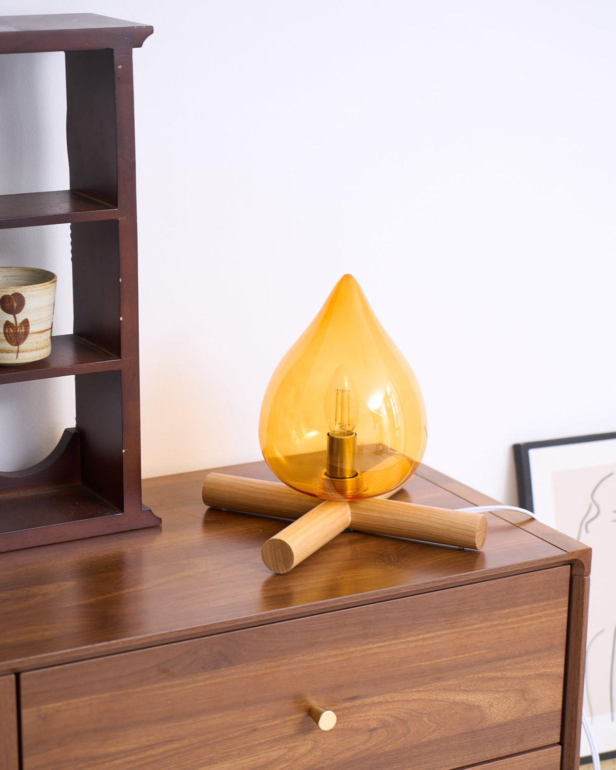 Orange flame-shaped glass table lamp with solid wood cross base 35