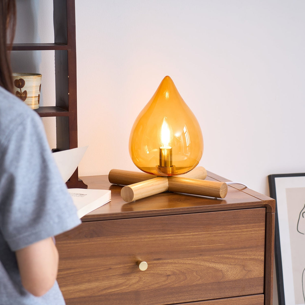 Orange flame-shaped glass table lamp with solid wood cross base 38