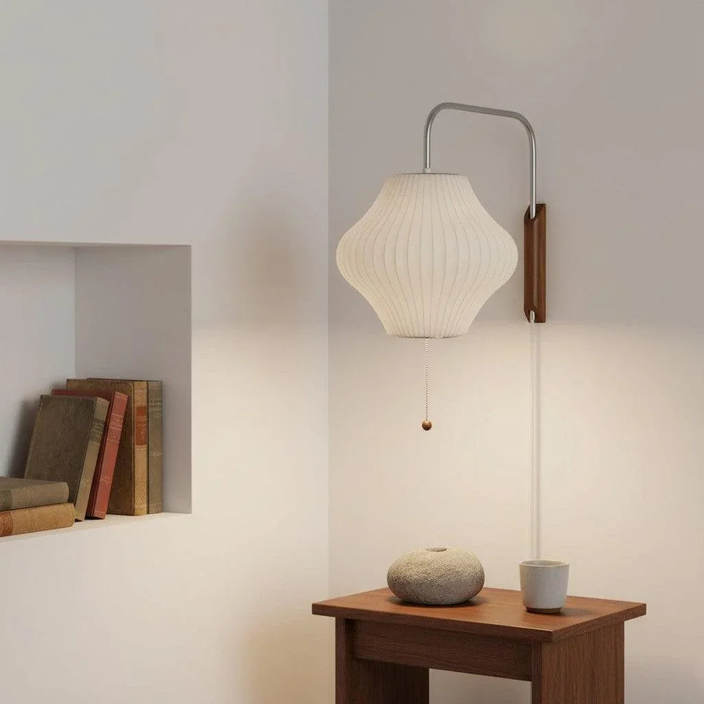 Ribbed bubble wall light above a side table
