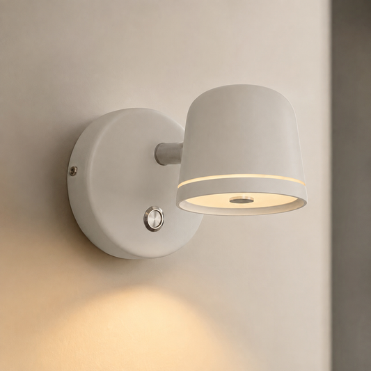 Pearly white round LED bedside wall light in warm light