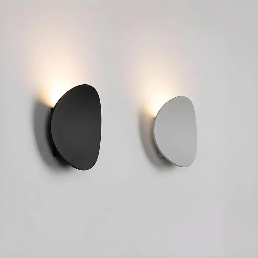 Black and white pebble lights with indirect glow