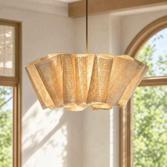 Layered pleated fabric pendant with warm illumination