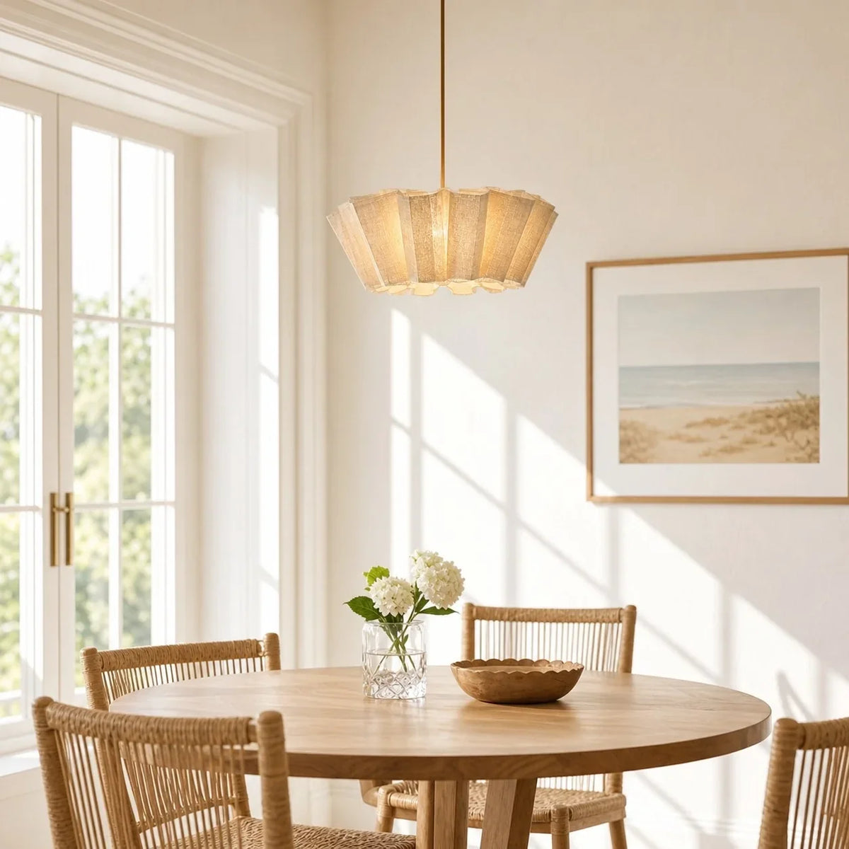 Pleated fabric pendant above a round table