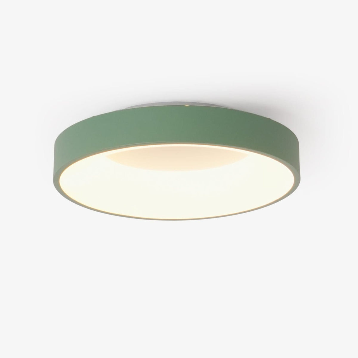Green recessed-ring LED flush ceiling light mounted on a ceiling