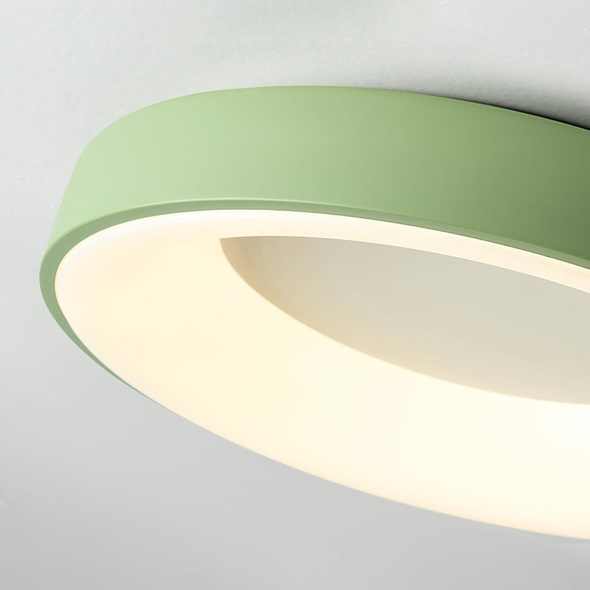 Green recessed-ring LED flush ceiling light frame and diffuser detail