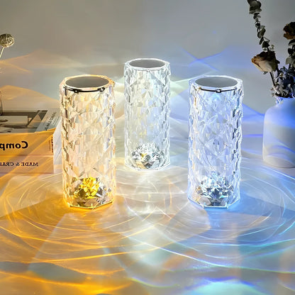 Three cylinder lamps showing warm, white and blue light