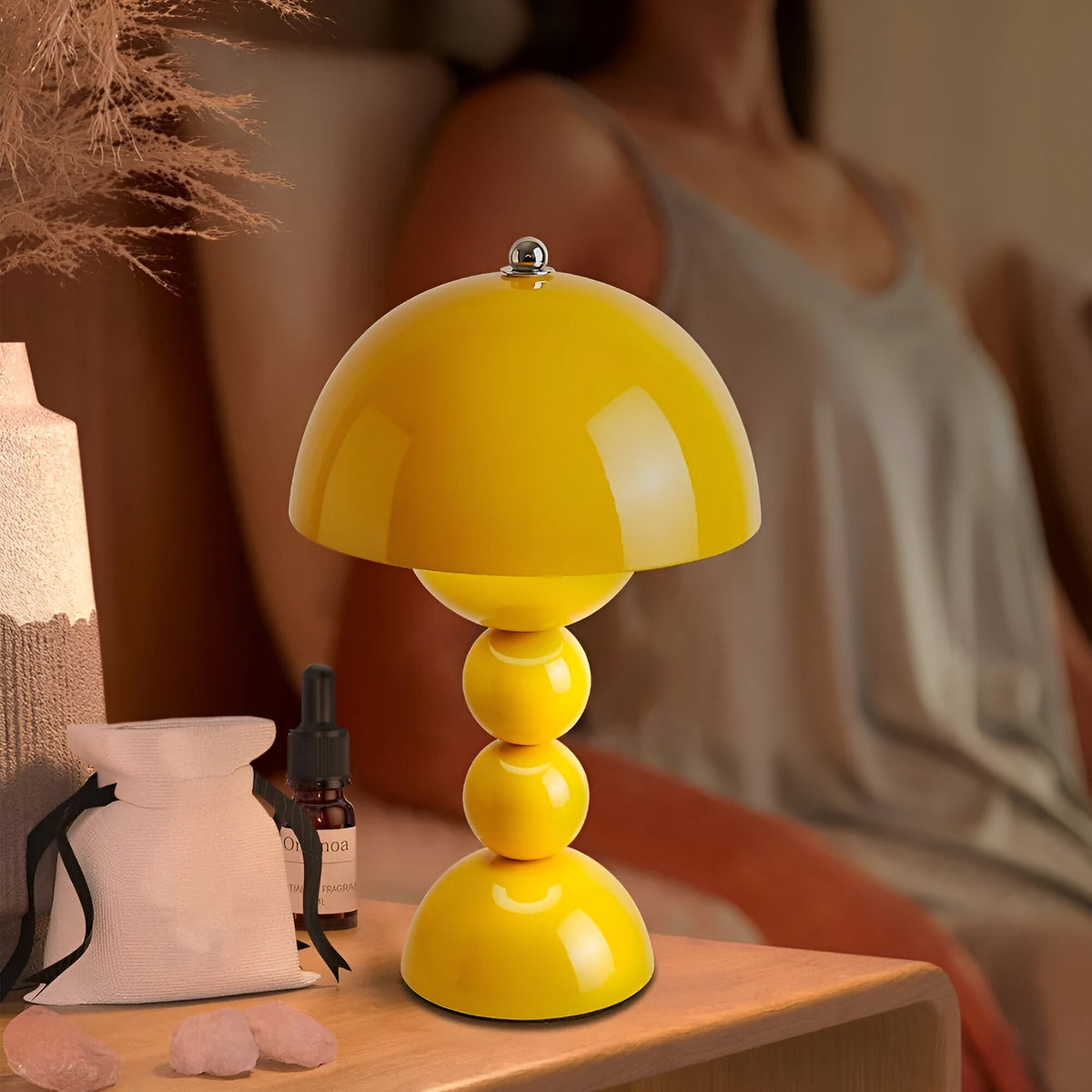 Yellow dome table lamp with sculptural stacked sphere base