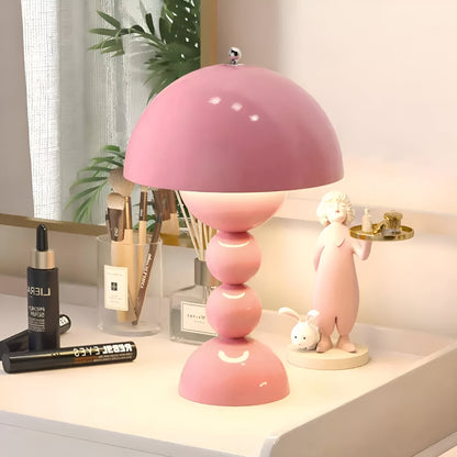 Pink dome table lamp with sculptural stacked sphere base