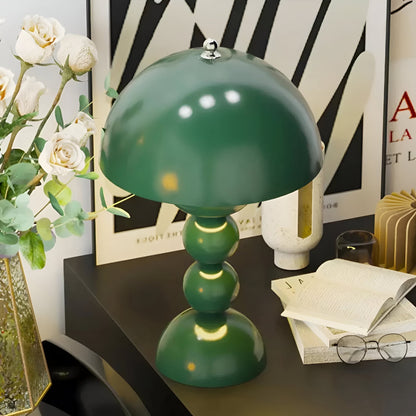 Green dome table lamp with sculptural stacked sphere base