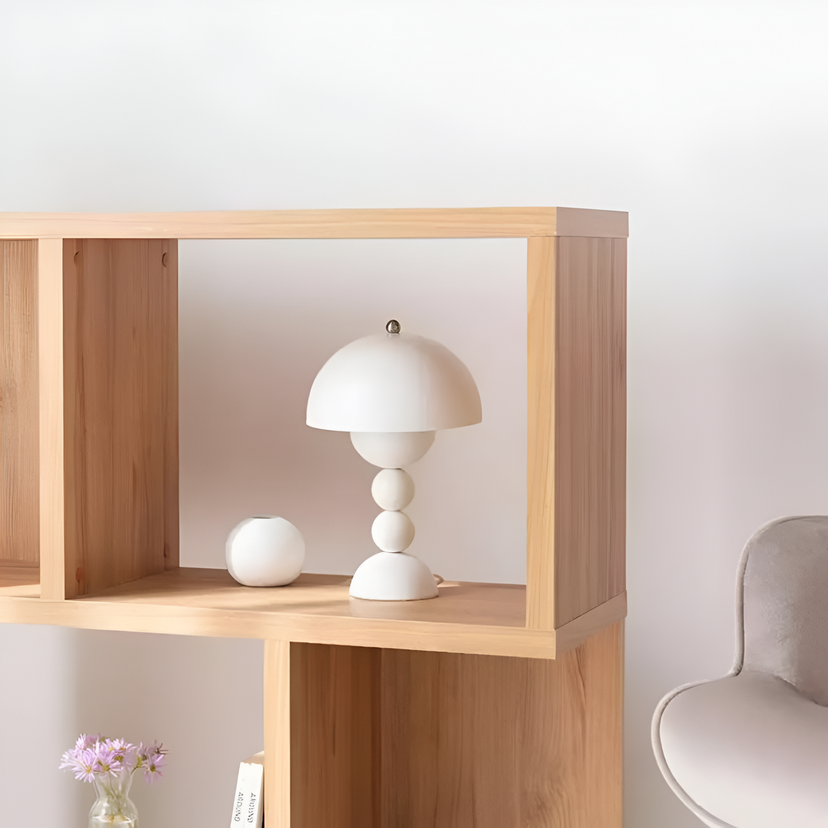 White dome table lamp with sculptural stacked sphere base