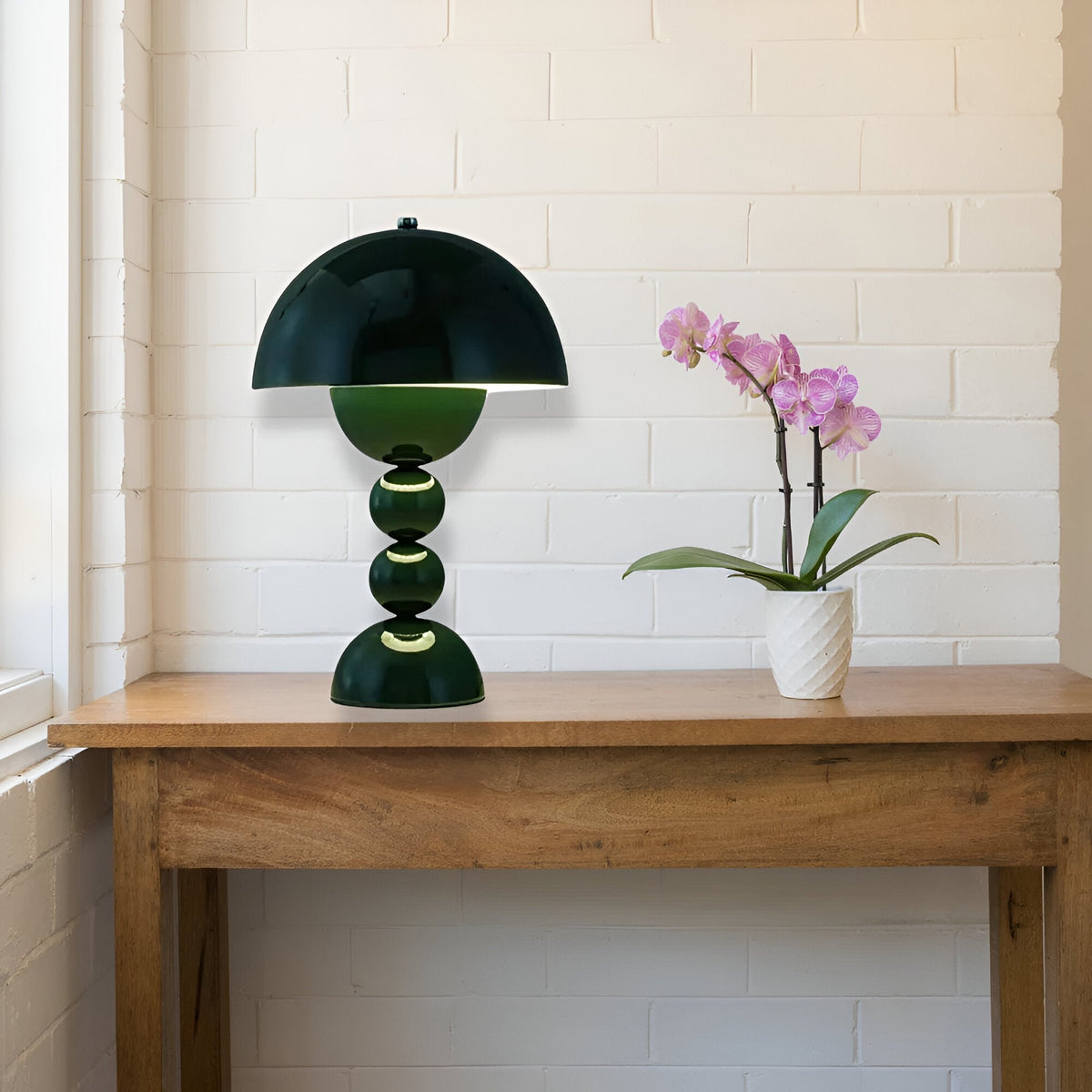 Green dome table lamp with sculptural stacked sphere base