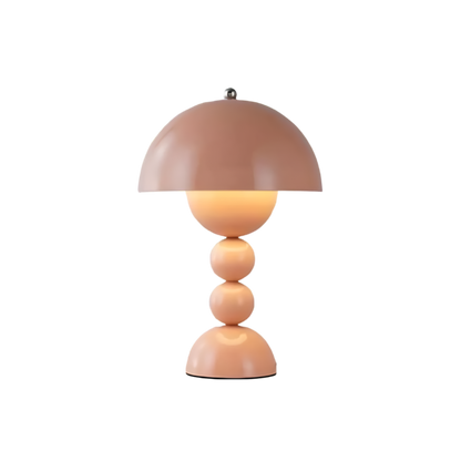 Pink dome table lamp with sculptural stacked sphere base
