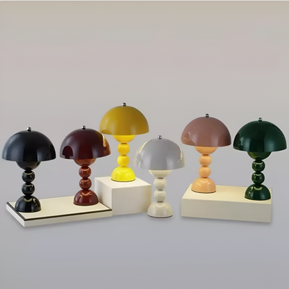 Dome table lamps in assorted finishes with stacked sphere bases