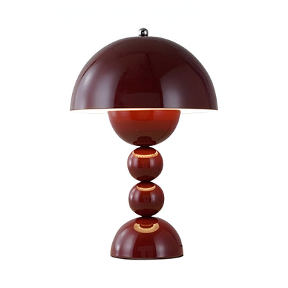 Red dome table lamp with sculptural stacked sphere base